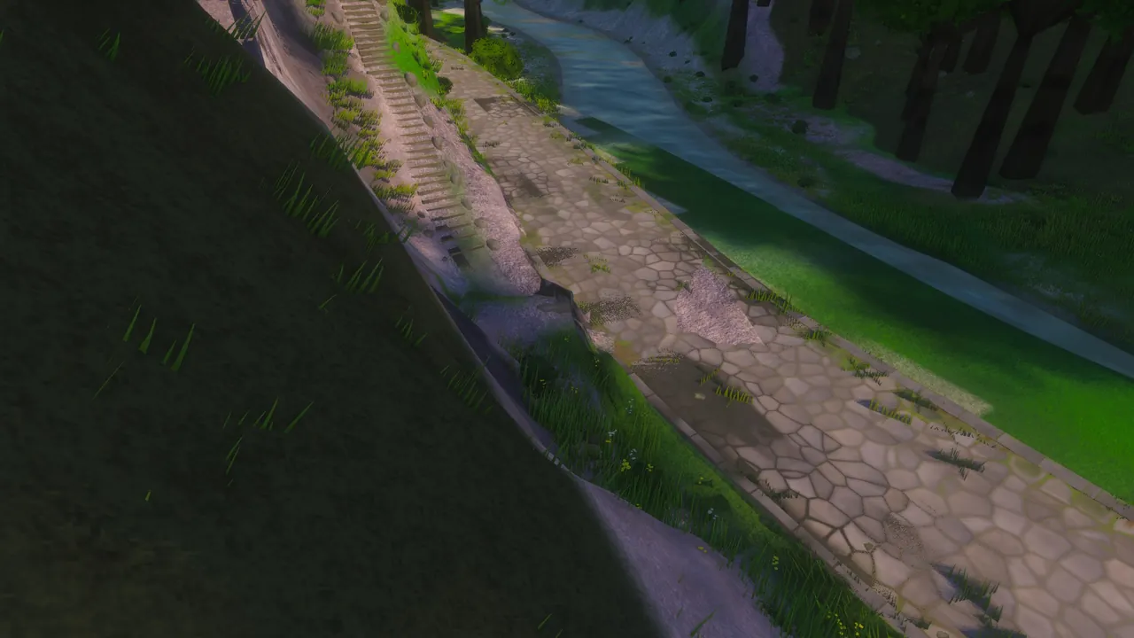 In-game render of a paved stone road along a river at the foot of a grassy bank. A flight of stone steps comes down the bank and ends in a jumble of stone at the road's kerb.