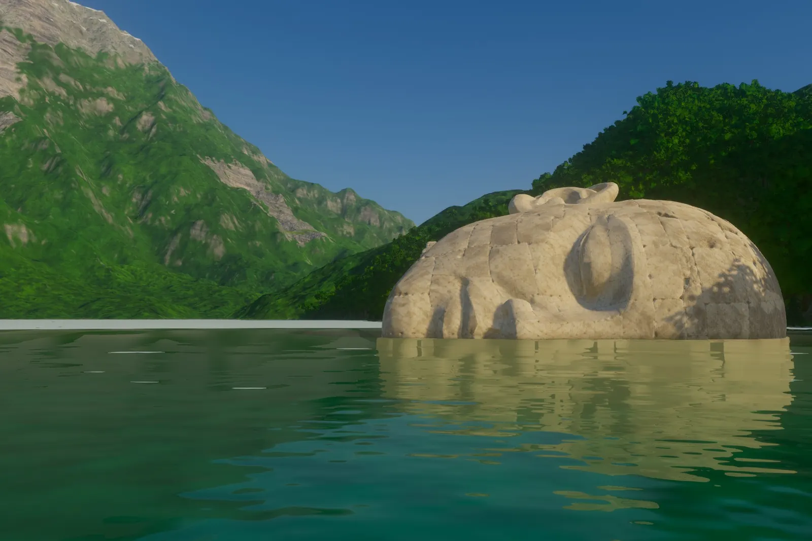 A pale stone head lying sideways in Ho Lang, with its reflected face extending into the green lake
